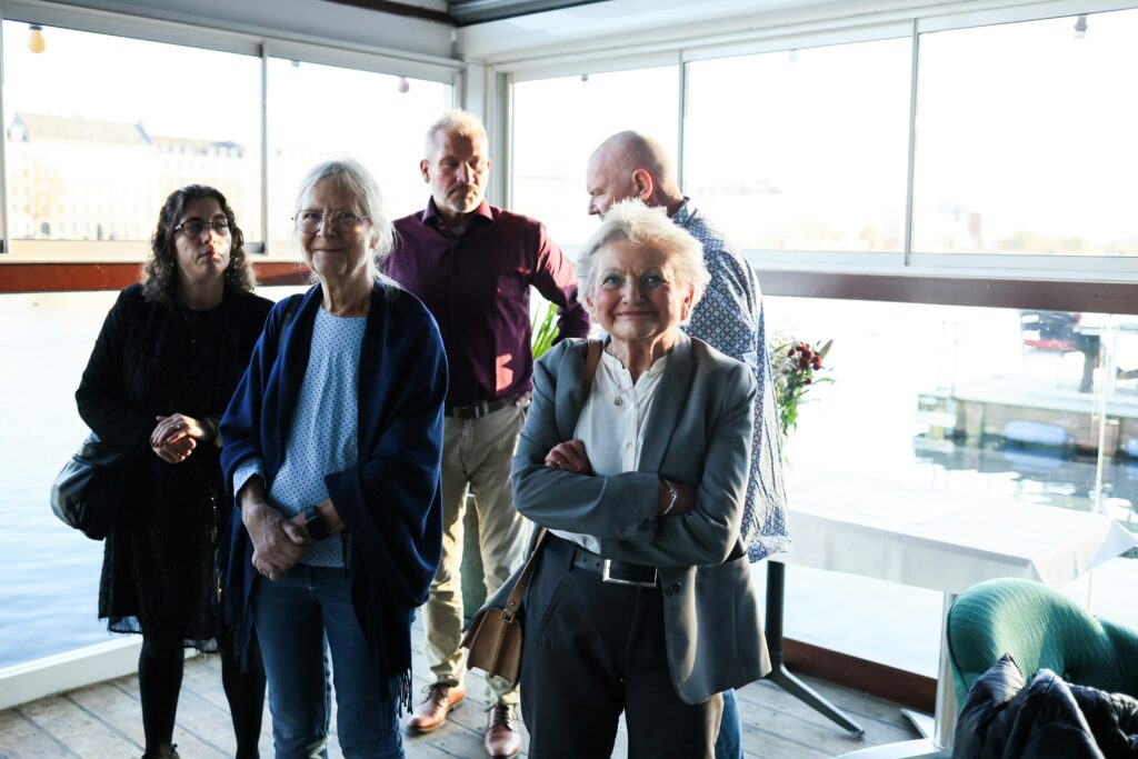Group of older senior employees in office building