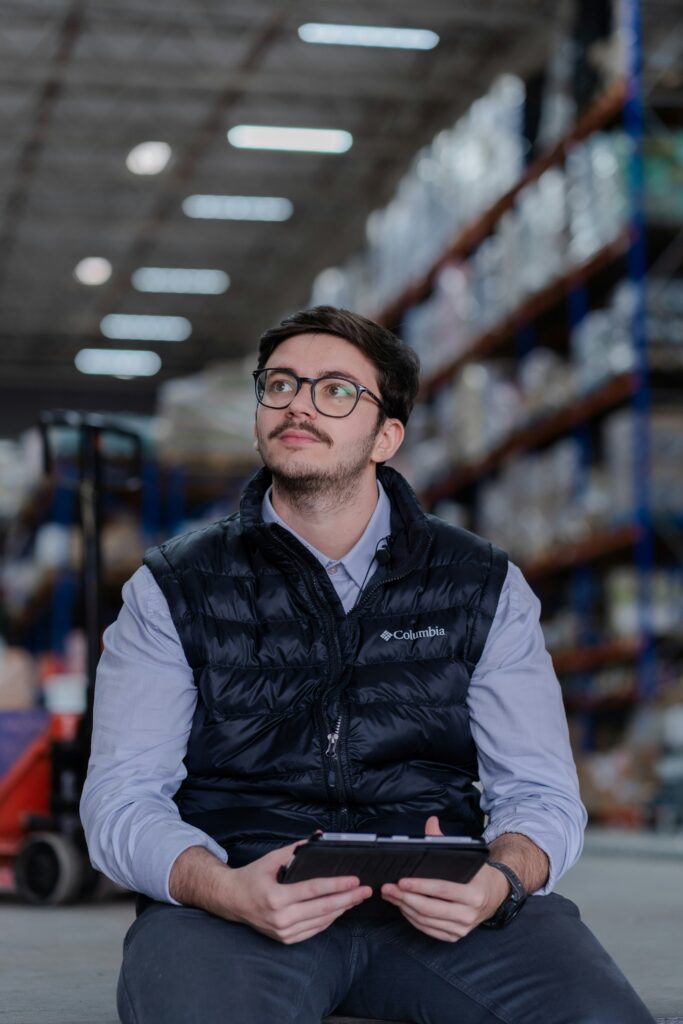 Minority shareholder sitting in warehouse logistics business