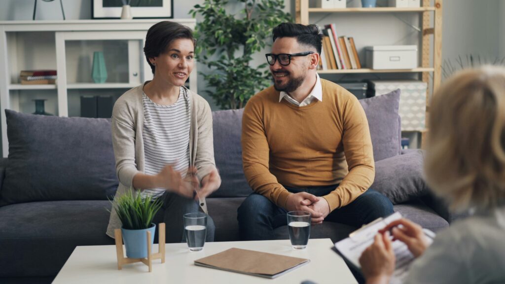 Young couple preparing post nuptial paperwork